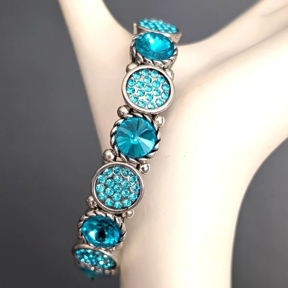 Silver stretch bracelet with bright blue beads